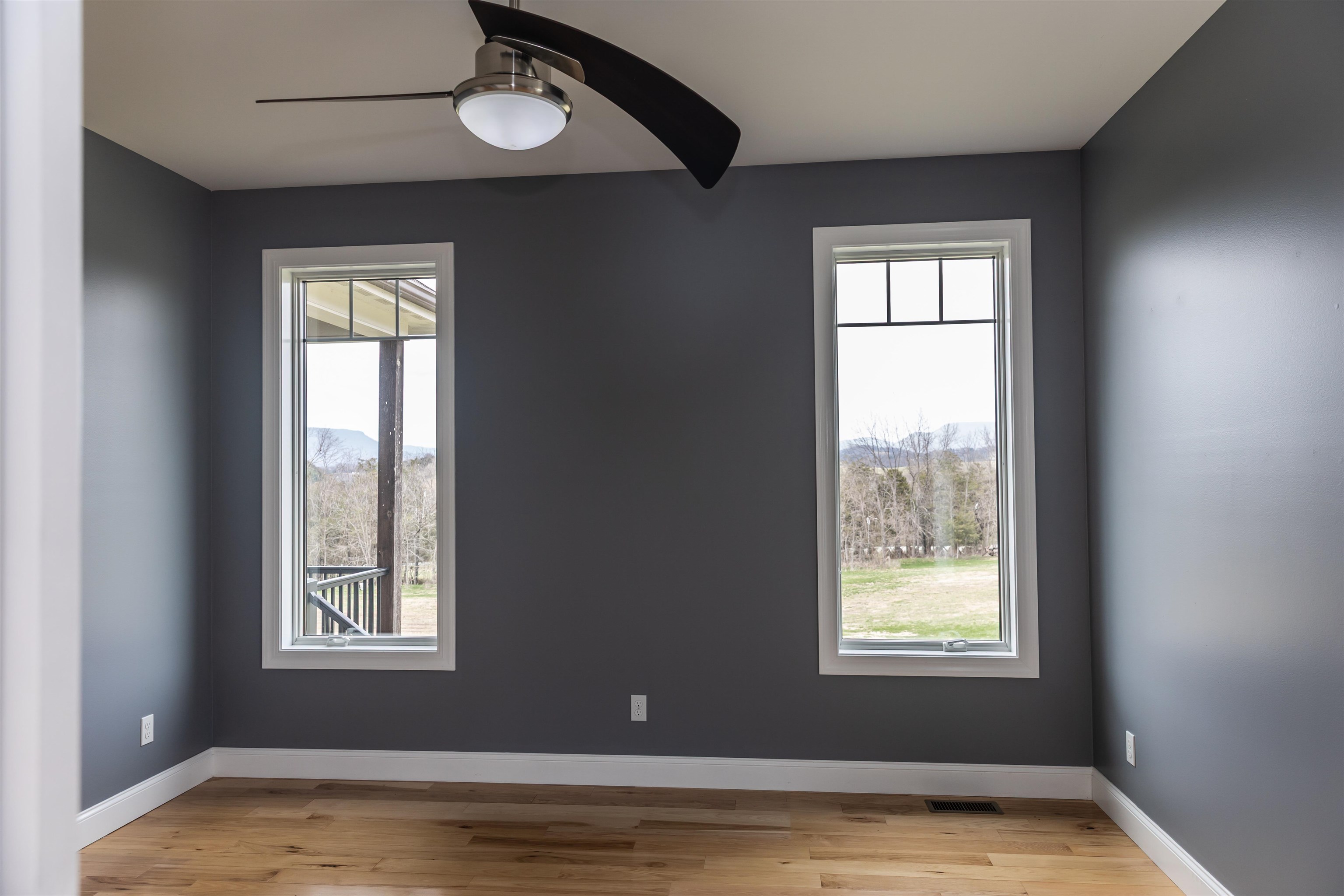 165 Marl Ridge Road Lexington, VA 24450 - Photo 43 of 72 a view of an empty room with wooden floor and a window