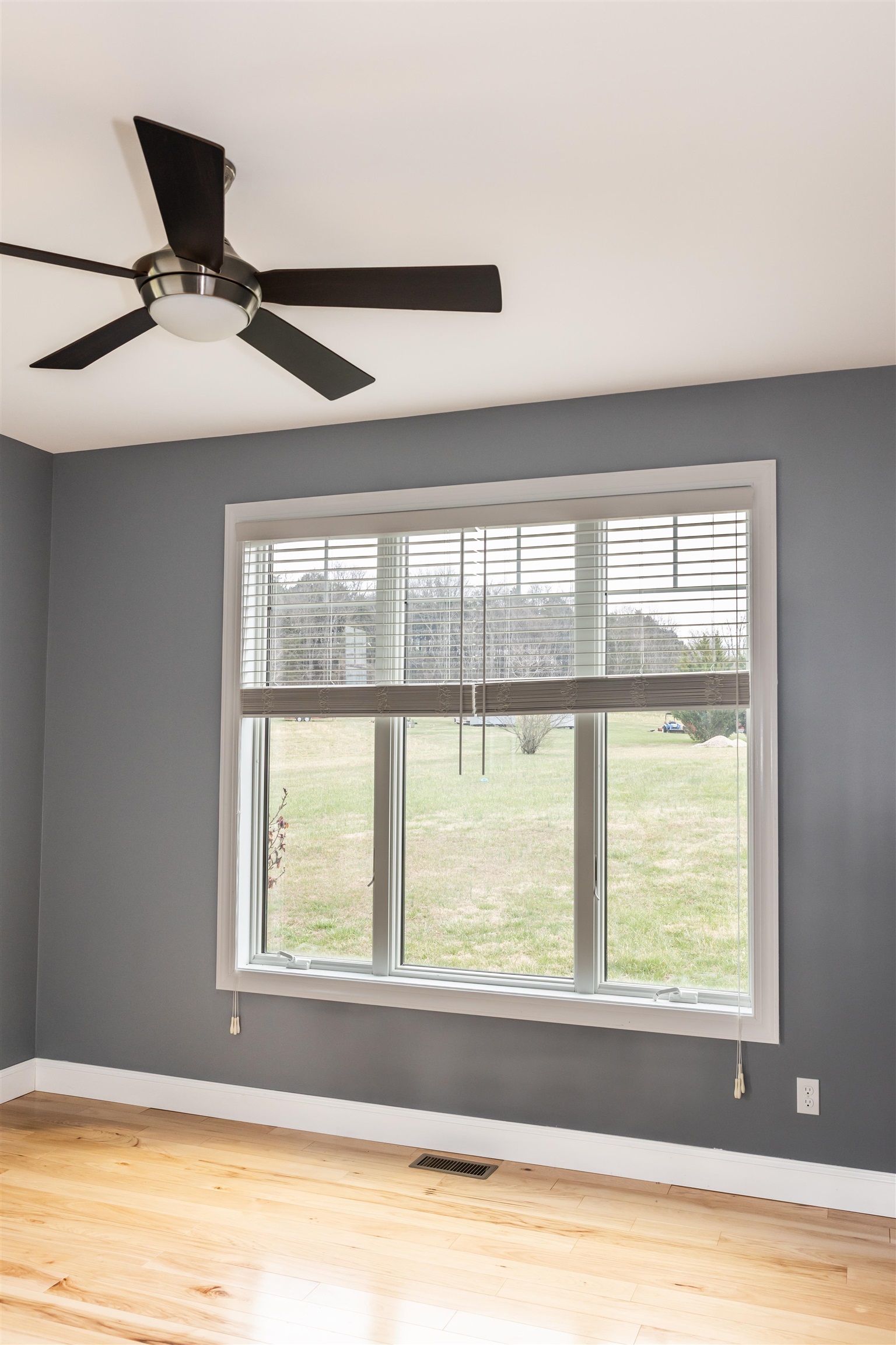 165 Marl Ridge Road Lexington, VA 24450 - Photo 56 of 72 a view of a livingroom with a window and a ceiling fan