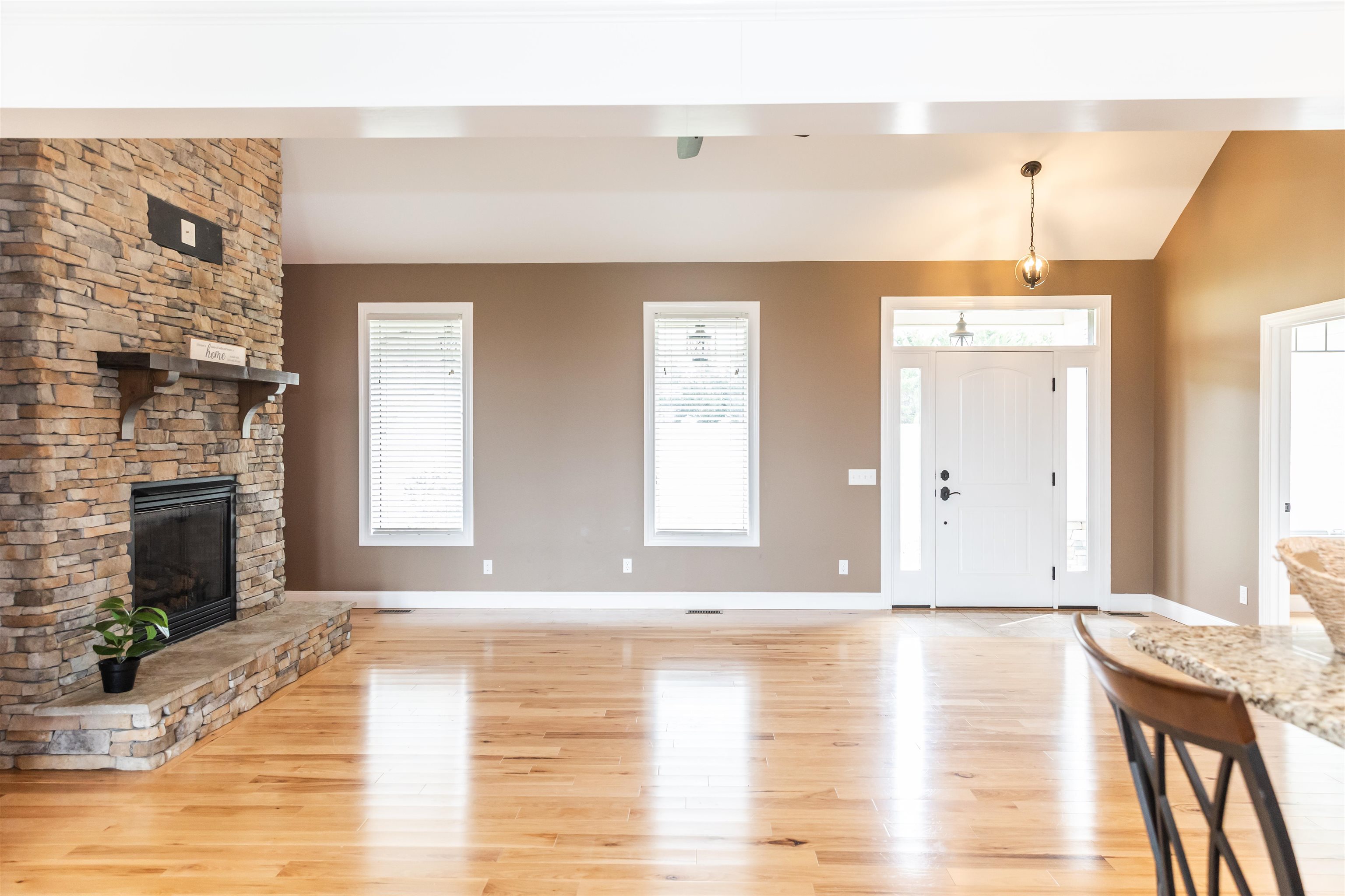 165 Marl Ridge Road Lexington, VA 24450 - Photo 9 of 72 a view of a livingroom with wooden floor and a fireplace