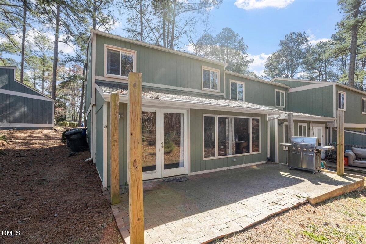 712 Godwin Court Raleigh, NC 27606 - Photo 25 of 27 a view of a house with a garden