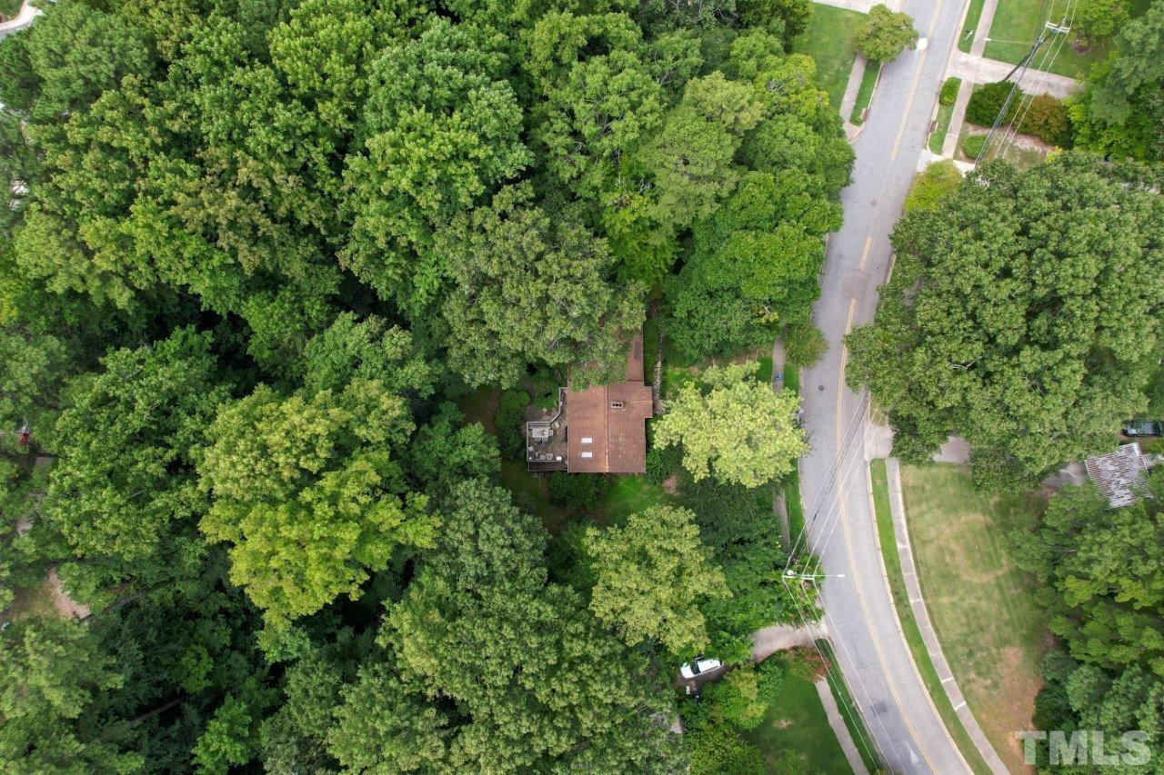 300 Dartmouth Road Raleigh, NC 27609 - Photo 12 of 52 an aerial view of a house with a yard