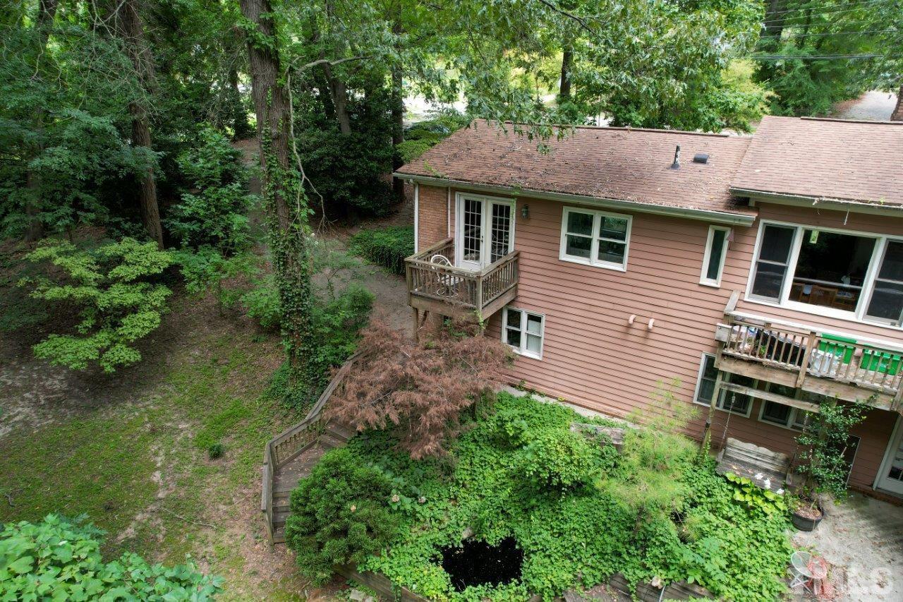 300 Dartmouth Road Raleigh, NC 27609 - Photo 13 of 52 a aerial view of a house with yard and sitting area
