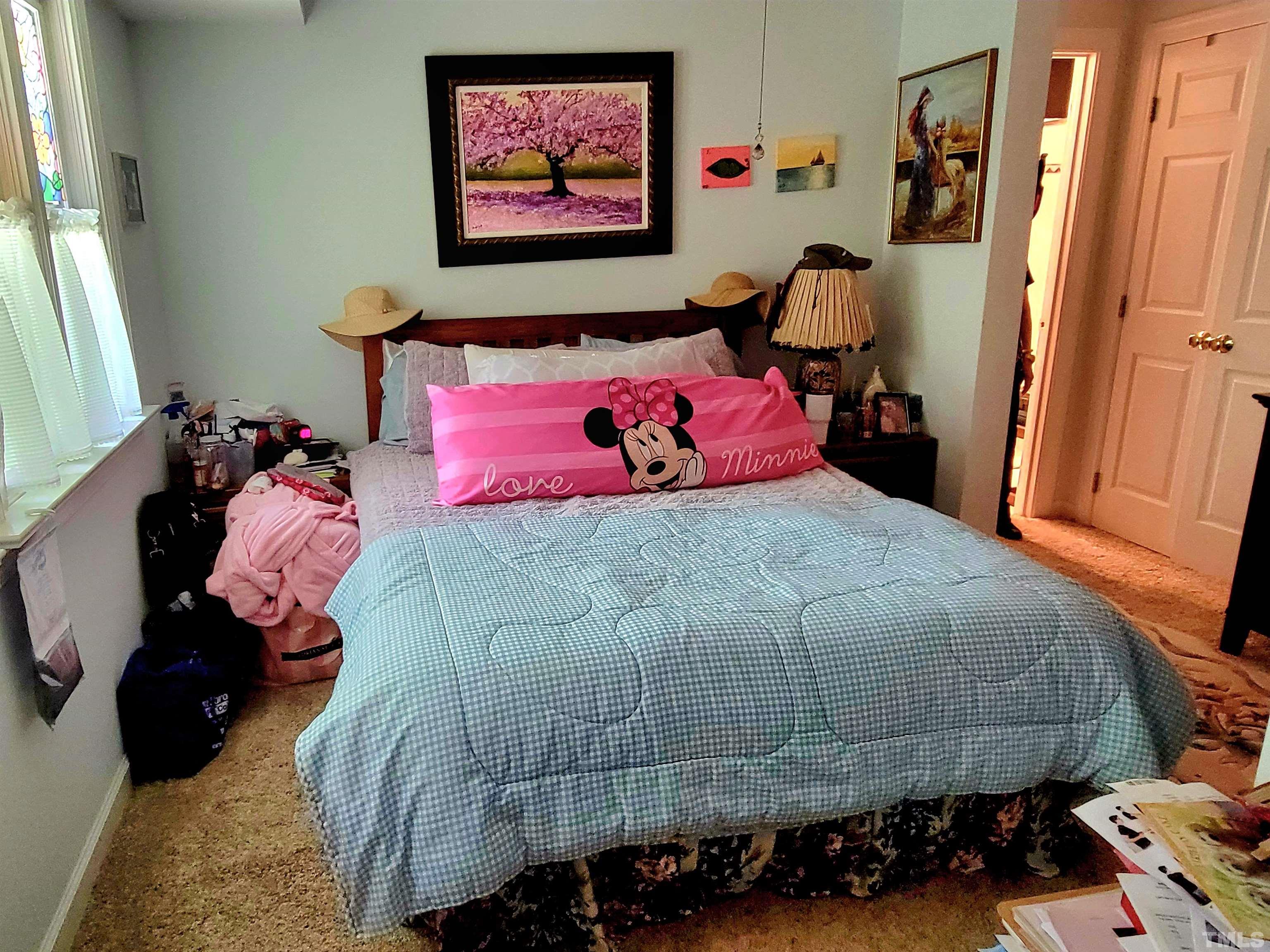 300 Dartmouth Road Raleigh, NC 27609 - Photo 29 of 52 a bedroom with a bed and a window