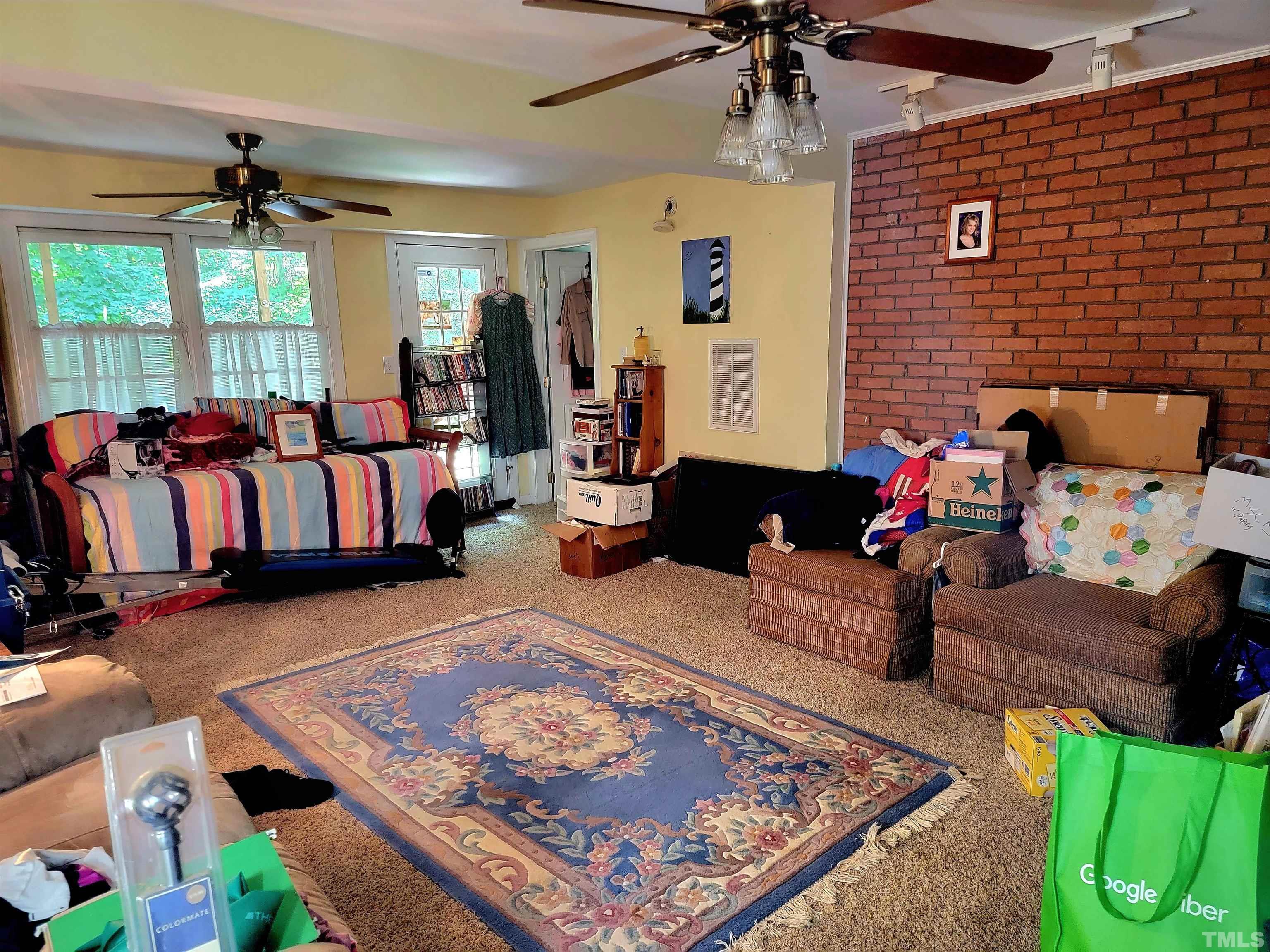 300 Dartmouth Road Raleigh, NC 27609 - Photo 30 of 52 a living room with furniture rug and window