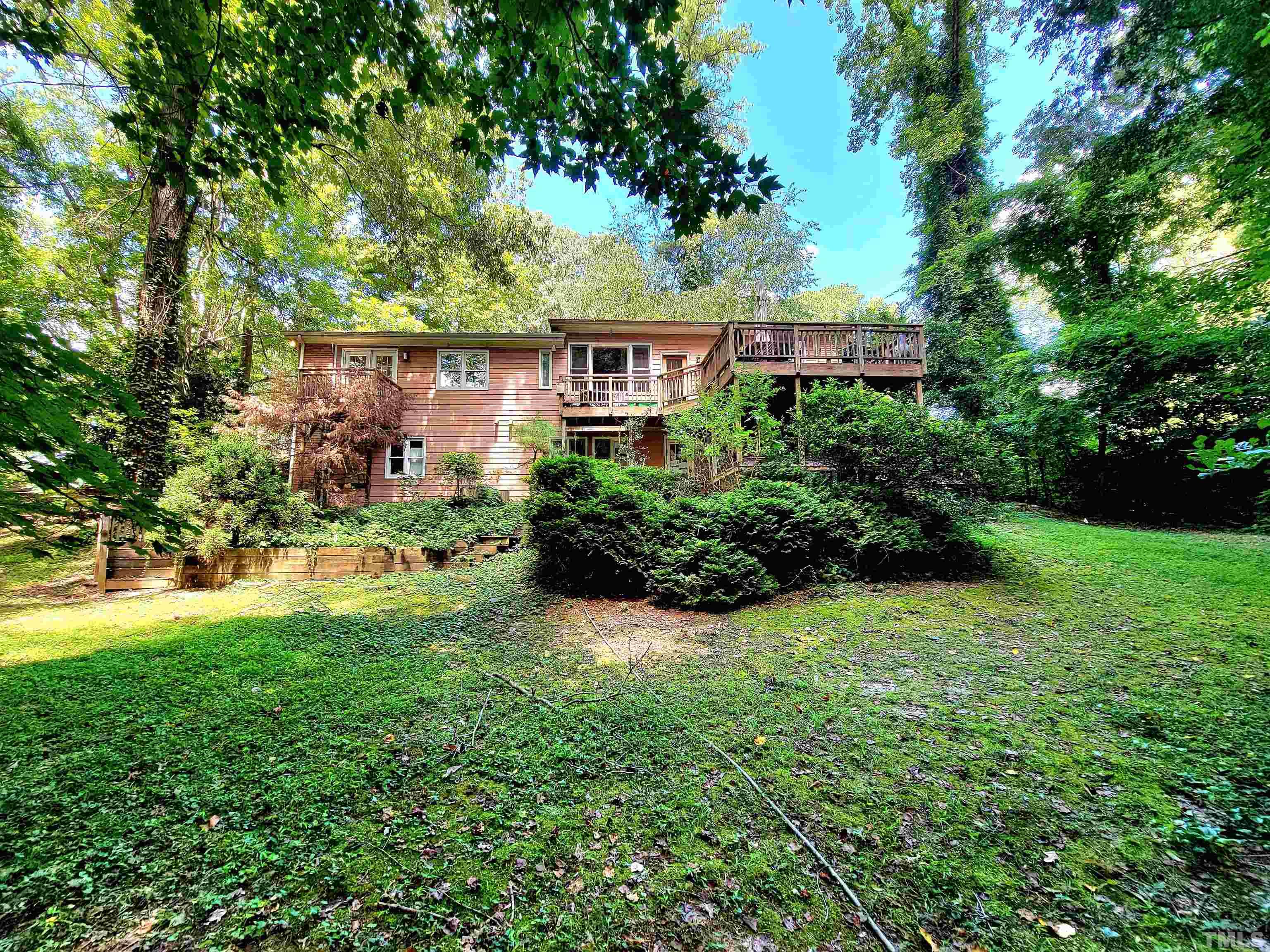 300 Dartmouth Road Raleigh, NC 27609 - Photo 3 of 52 front view of a house with a yard