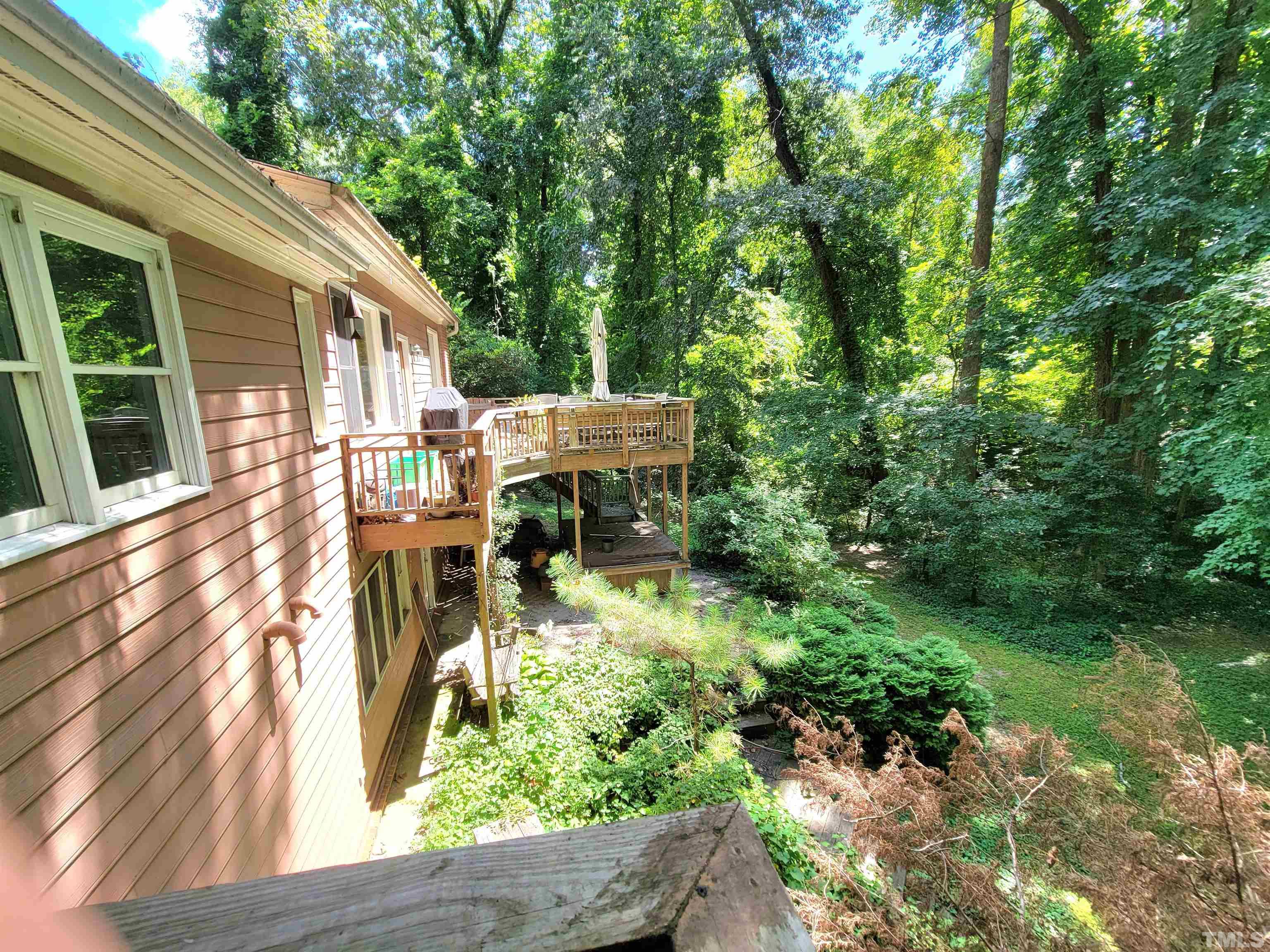 300 Dartmouth Road Raleigh, NC 27609 - Photo 36 of 52 a view of backyard with patio
