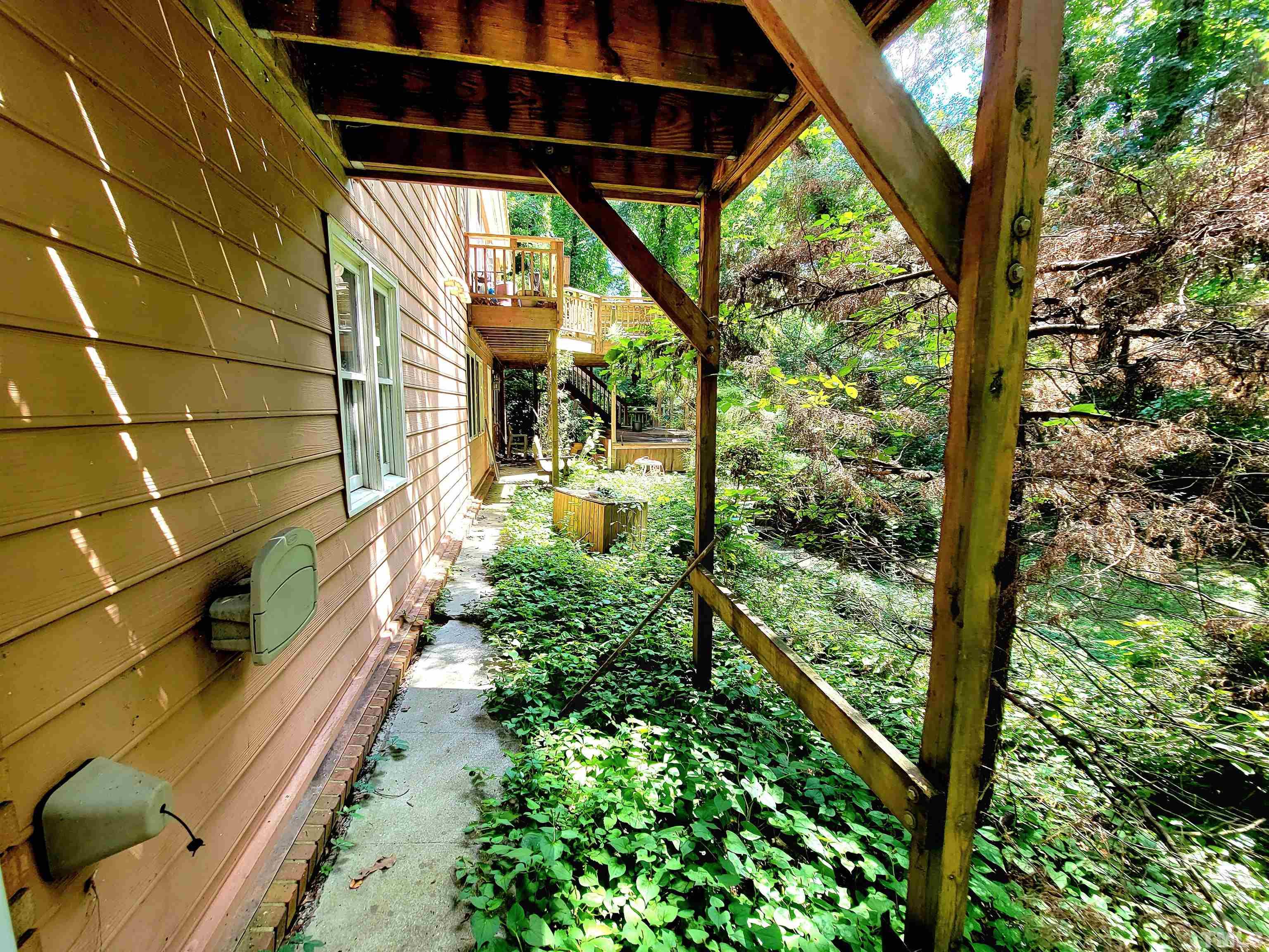 300 Dartmouth Road Raleigh, NC 27609 - Photo 42 of 52 a view of back yard from a balcony