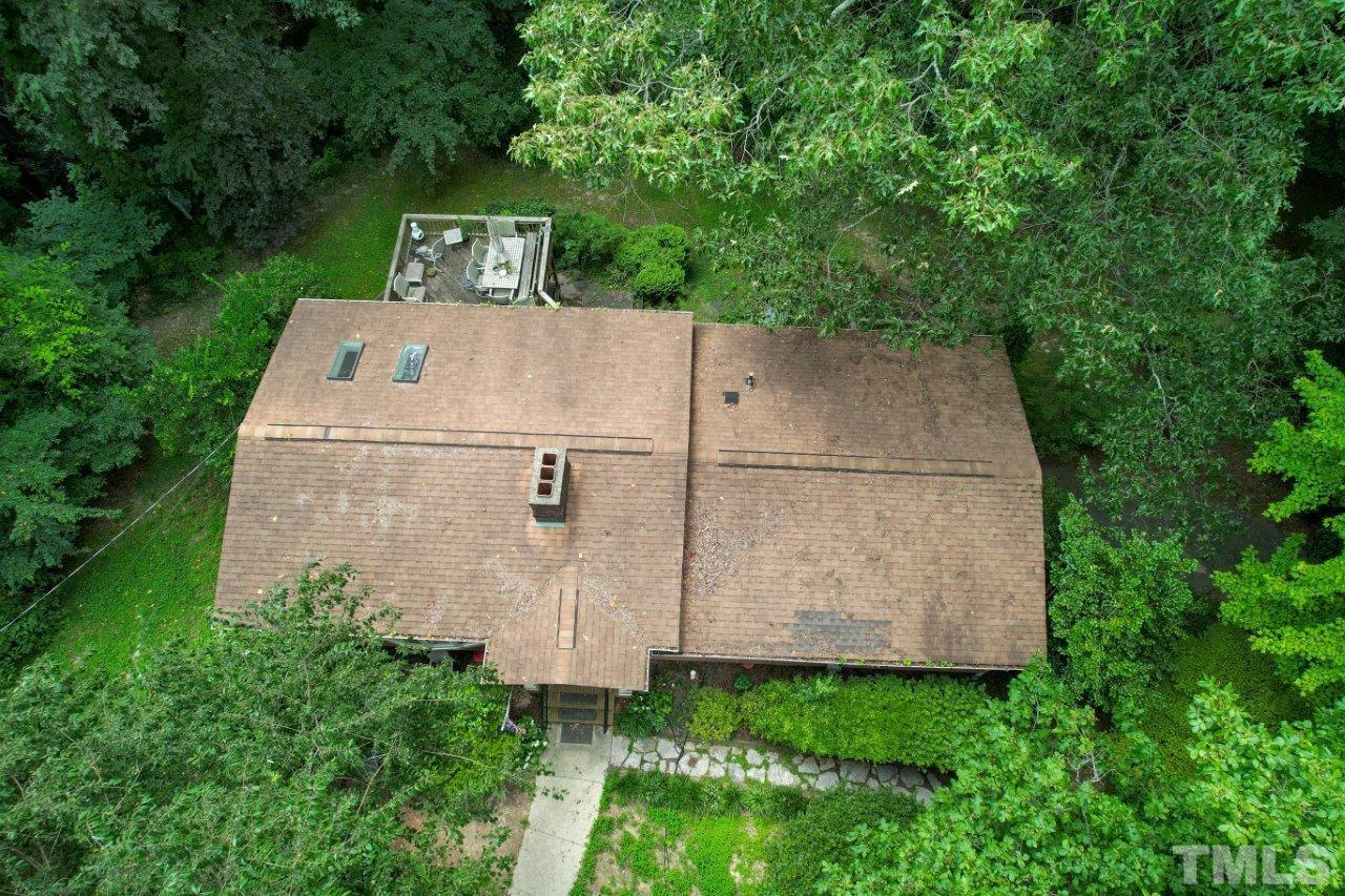 300 Dartmouth Road Raleigh, NC 27609 - Photo 52 of 52 an aerial view of a house with a yard