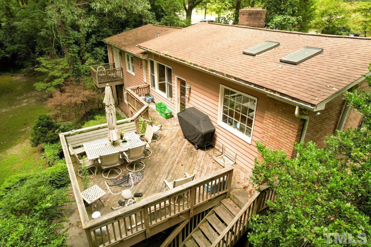 300 Dartmouth Road Raleigh, NC 27609 - Photo 7 of 52 a view of a house with roof deck and sitting area