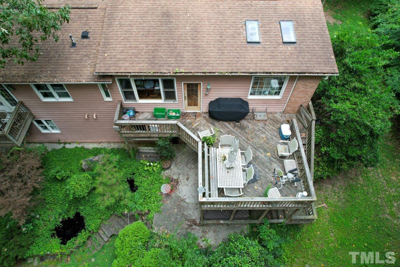 300 Dartmouth Road Raleigh, NC 27609 - Photo 8 of 52 an aerial view of a house with garden space and street view