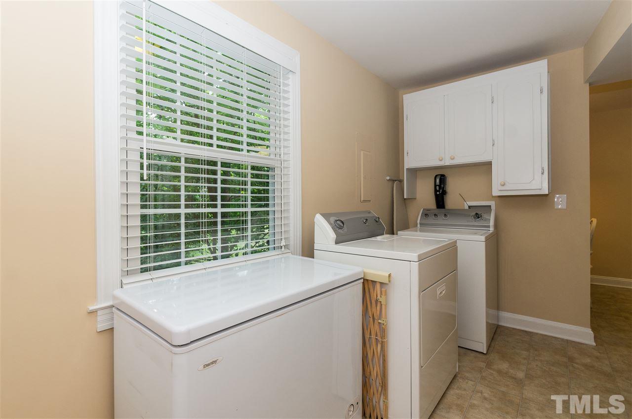 2132 Milburnie Road Raleigh, NC 27610 - Photo 19 of 23 a utility room with dryer and washer