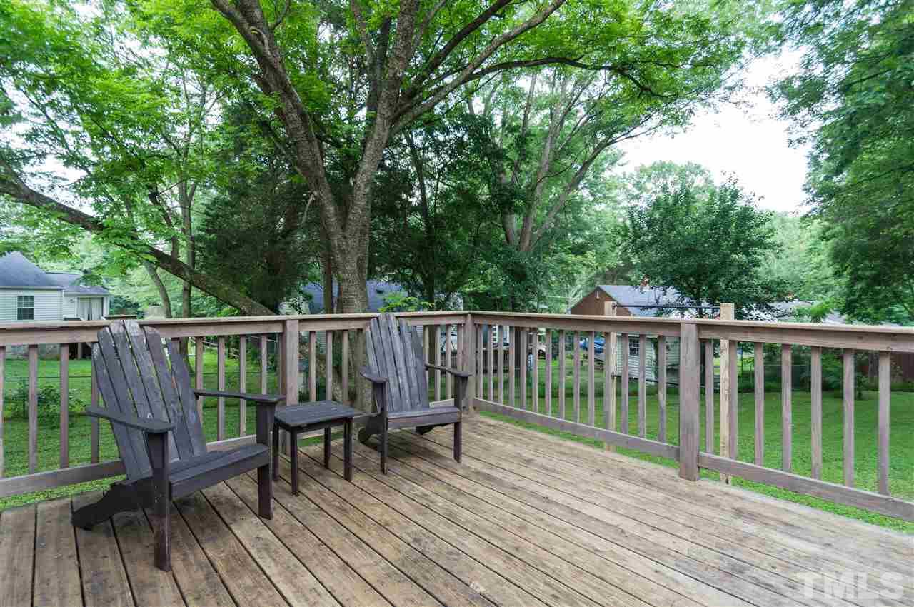 2132 Milburnie Road Raleigh, NC 27610 - Photo 20 of 23 a view of balcony with wooden floor and fence