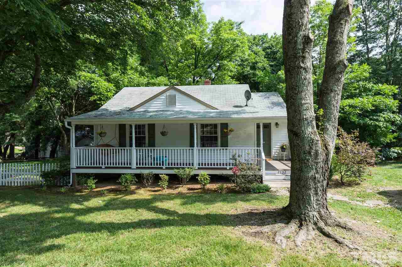 2132 Milburnie Road Raleigh, NC 27610 - Photo 23 of 23 a view of a house with a yard balcony and sitting area