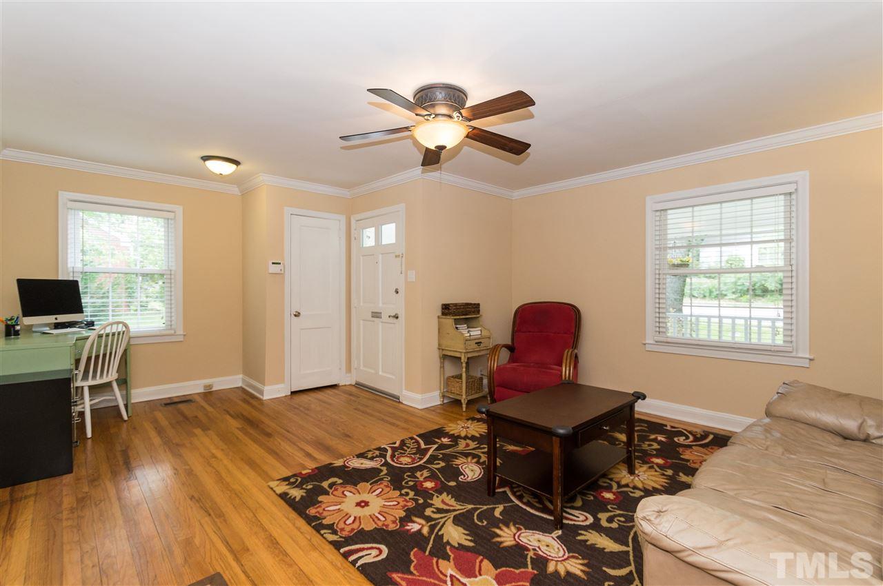 2132 Milburnie Road Raleigh, NC 27610 - Photo 5 of 23 a living room with a couch furniture and a window