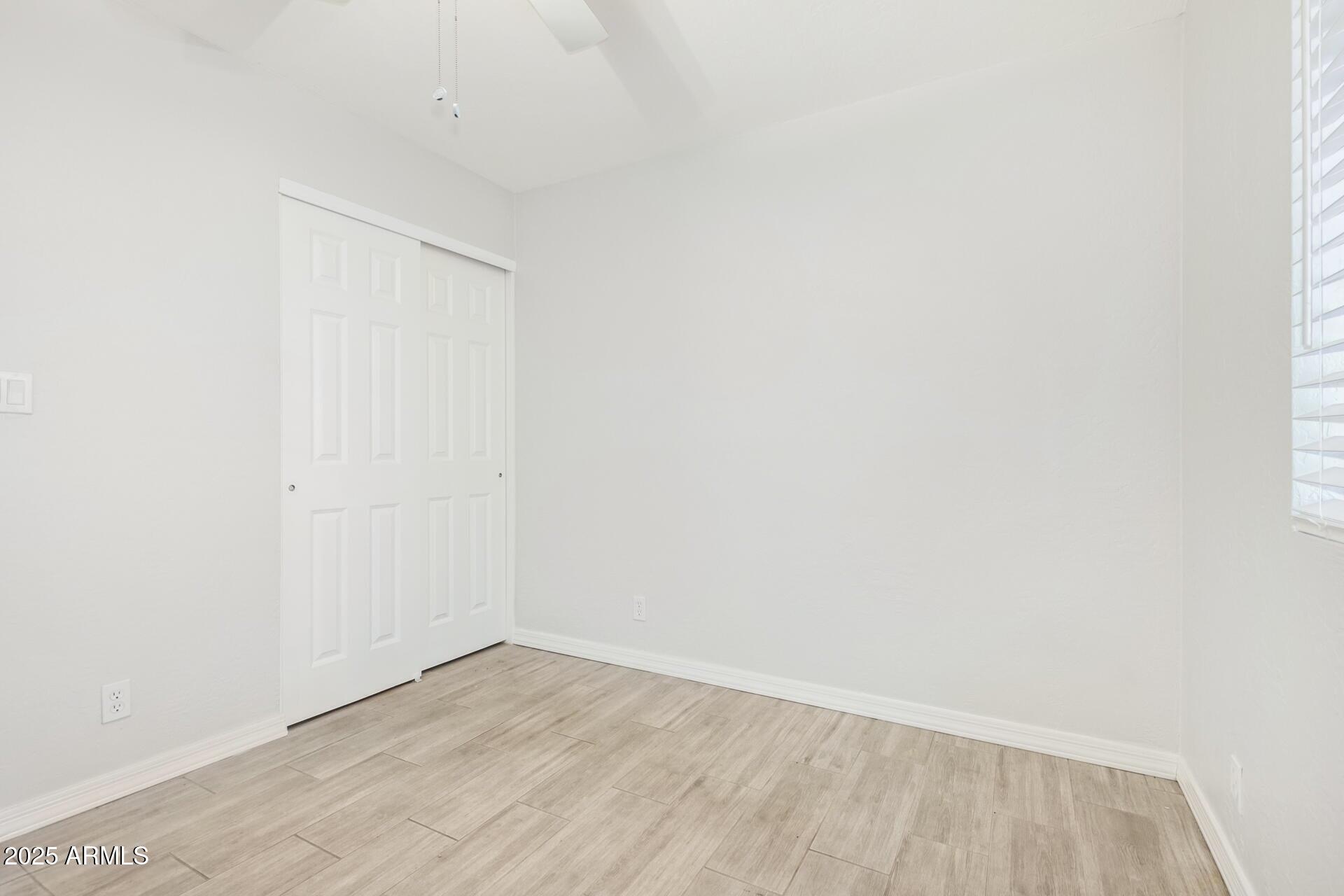 1619 West Peoria Avenue, Unit 2 Phoenix, AZ 85029 - Photo 8 of 8 a view of an empty room