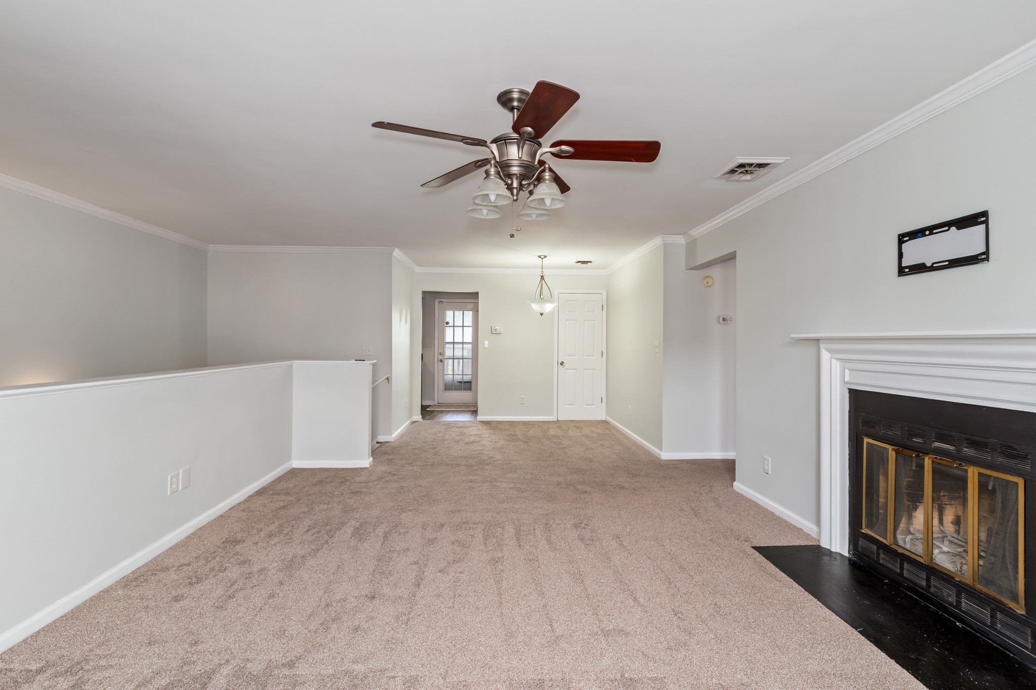 207 Ellington Place Madison, TN 37115 - Photo 14 of 24 a view of a livingroom with a ceiling fan window and fireplace