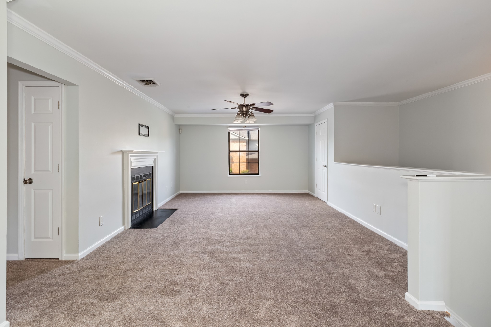 207 Ellington Place Madison, TN 37115 - Photo 15 of 24 a view of a big room with windows and fireplace