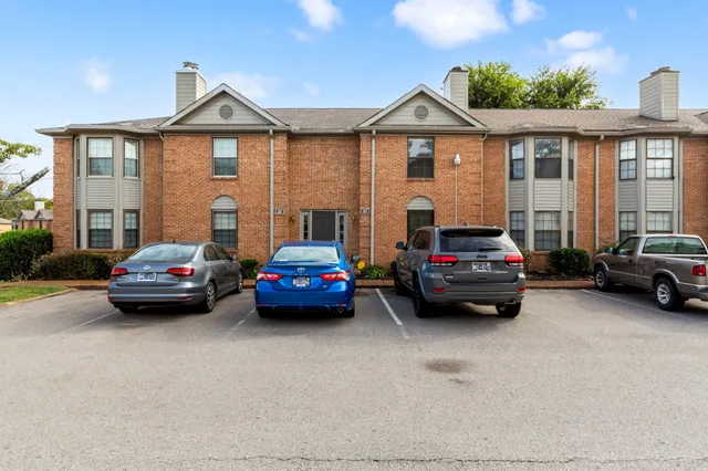 a car parked in front of a house