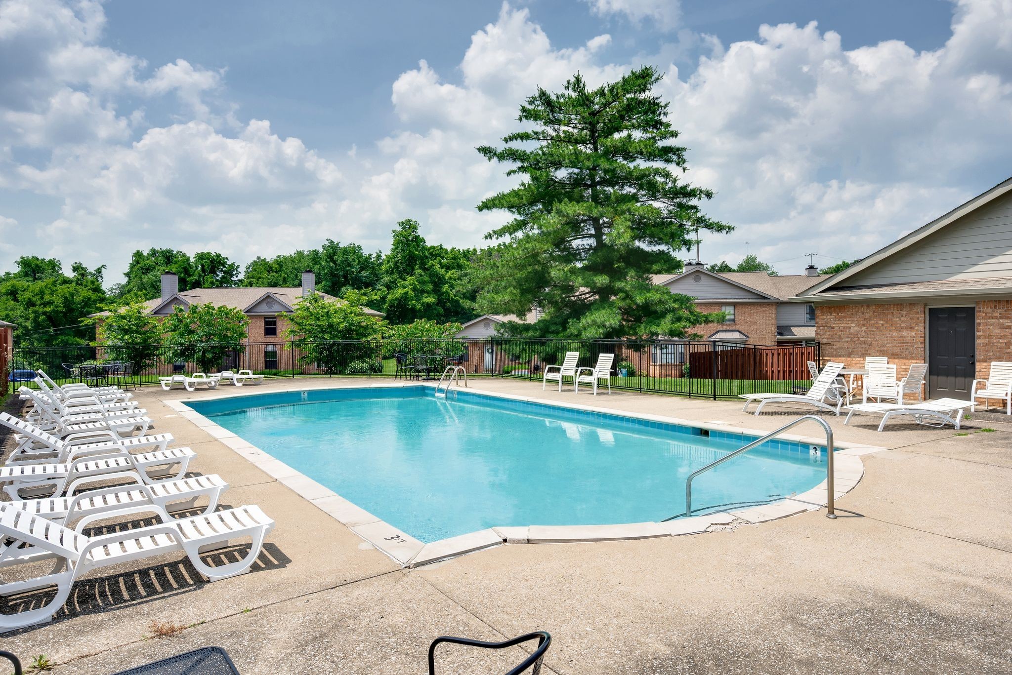 207 Ellington Place Madison, TN 37115 - Photo 22 of 24 a view of a swimming pool with lounge chair