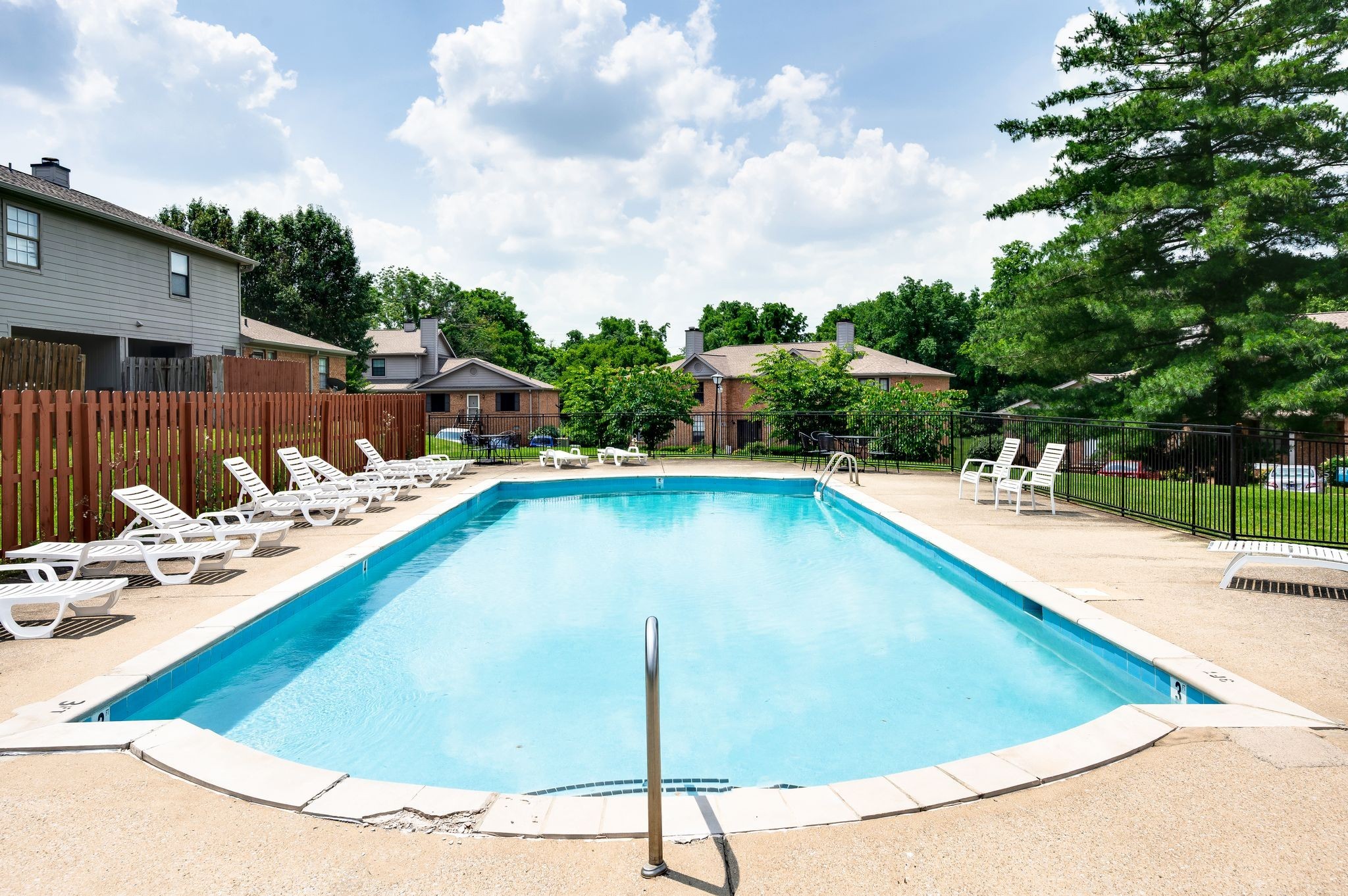 207 Ellington Place Madison, TN 37115 - Photo 23 of 24 a swimming pool with outdoor seating and yard in the back