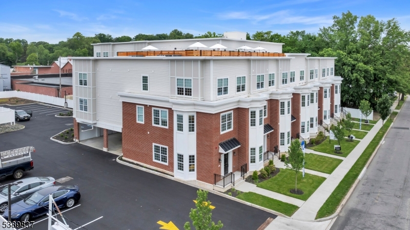 70 Ridgedale Avenue, Unit 102 Morristown, NJ 07960 - Photo 18 of 18 an aerial view of a house with a yard