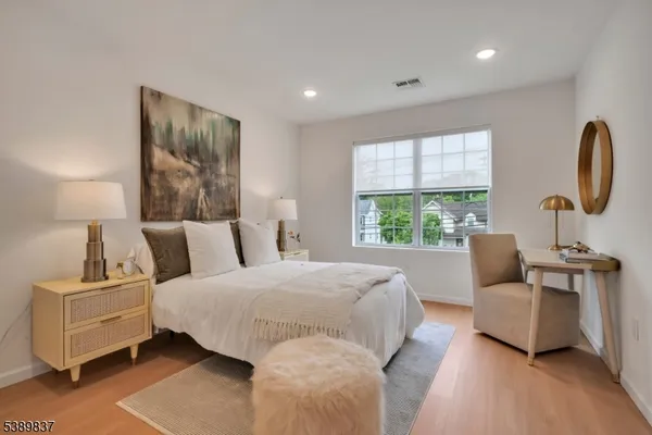 a bathroom with a toilet sink and tub