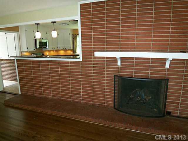 1943 Townsend Avenue Charlotte, NC 28205 - Photo 4 of 16 a bathroom with a sink a mirror and shower