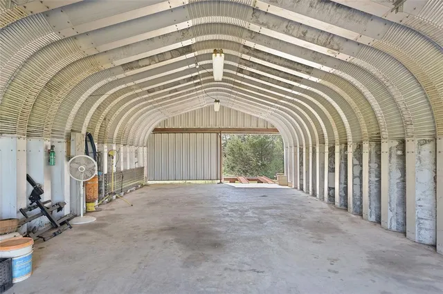 an aerial view of a house with a garden