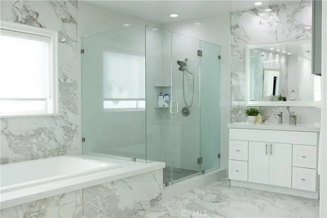 a living room with lots of furniture and clutter