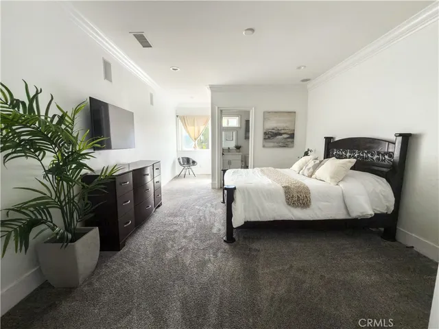 a view of a swimming pool with a lounge chair