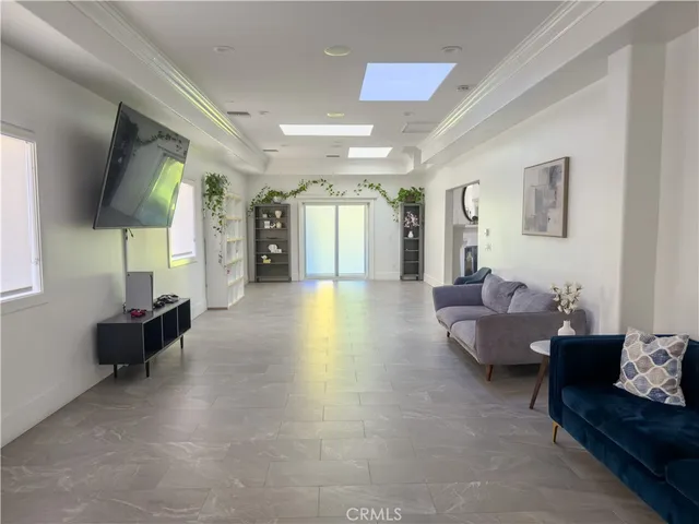 a living room with furniture and a couch