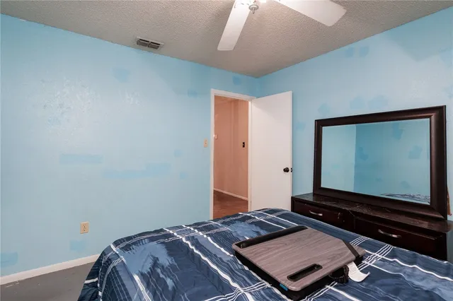 a living room with a flat screen tv