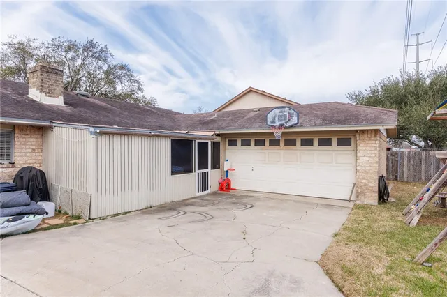 a front view of a house with a garage
