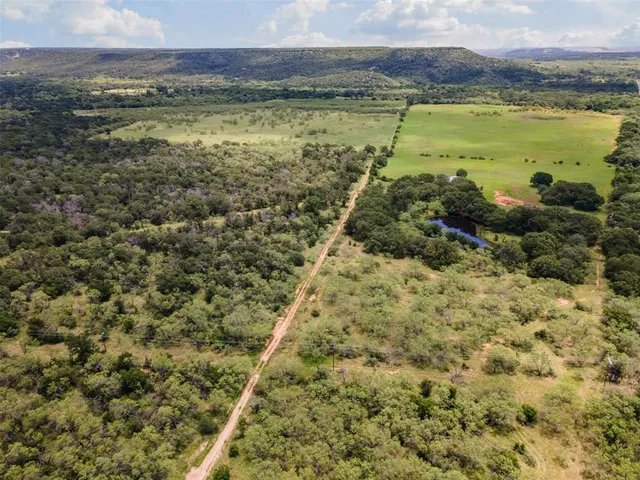 a view of a city with an ocean