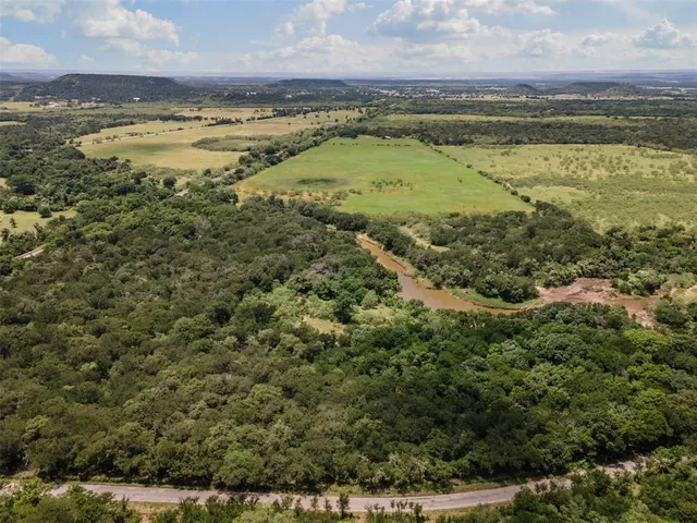 a view of a city with an ocean view