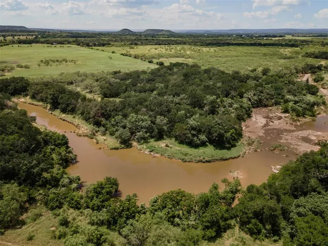 a view of a lake with a city