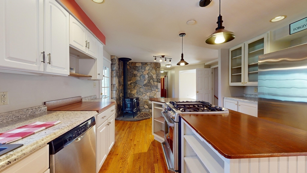 53 Dogwood Road Hubbardston, MA 01452 - Photo 12 of 42 a kitchen that has a lot of cabinets