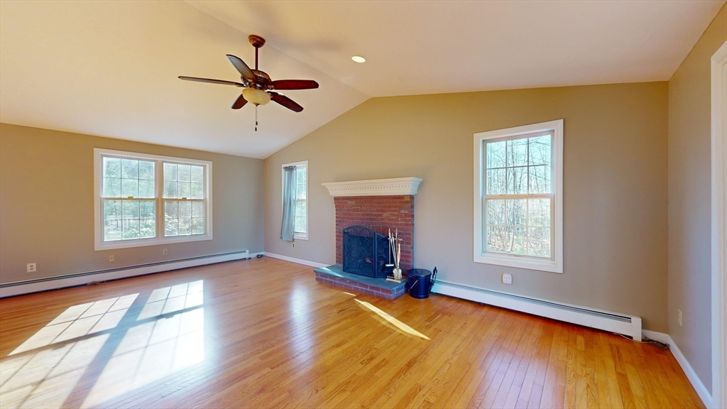 53 Dogwood Road Hubbardston, MA 01452 - Photo 19 of 42 a view of empty room with wooden floor and fan