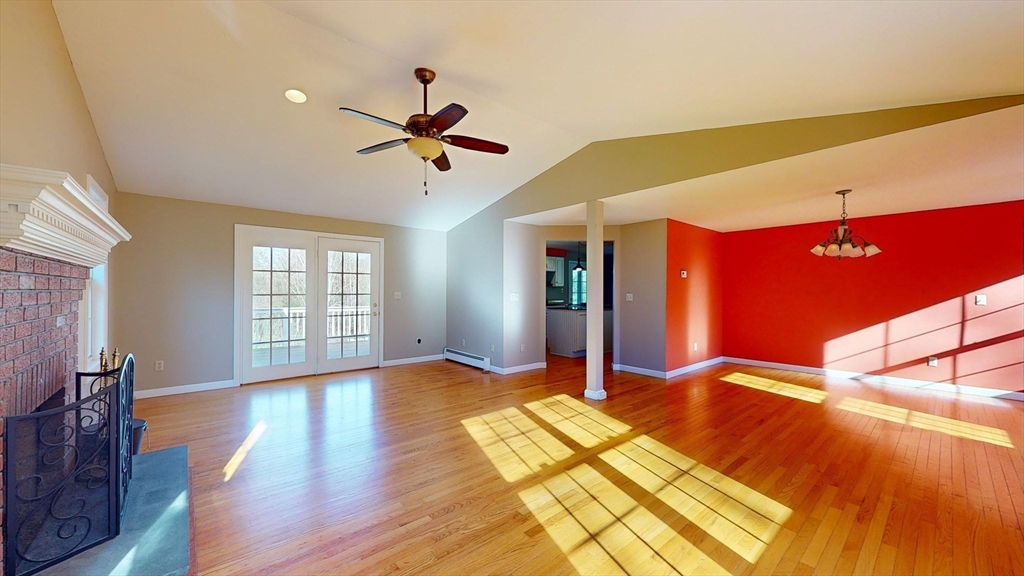 53 Dogwood Road Hubbardston, MA 01452 - Photo 20 of 42 a bedroom with a bed and wooden floor