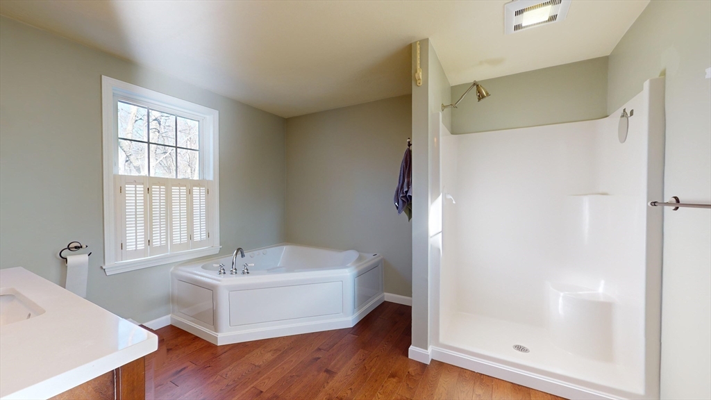 53 Dogwood Road Hubbardston, MA 01452 - Photo 30 of 42 a bathroom with a bathtub and a shower