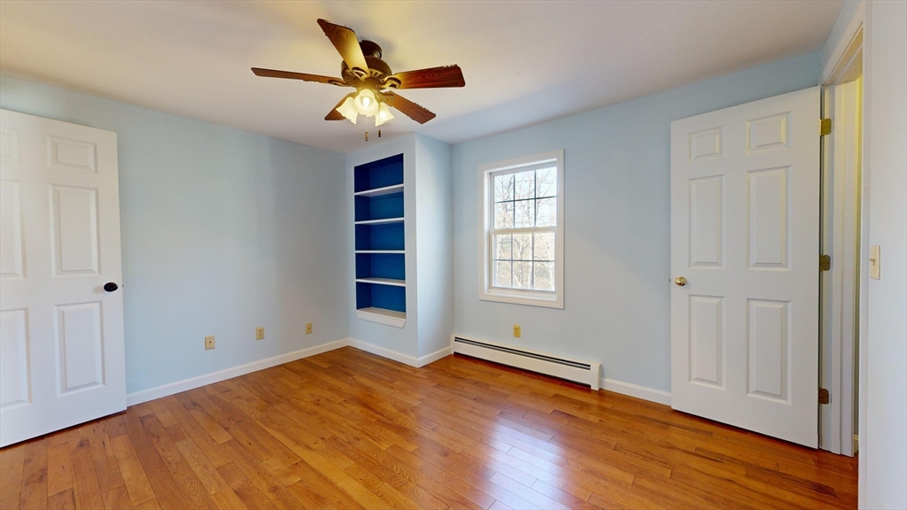 53 Dogwood Road Hubbardston, MA 01452 - Photo 32 of 42 wooden floor in an empty room with a window