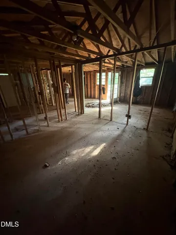 a view of a room with wooden walls