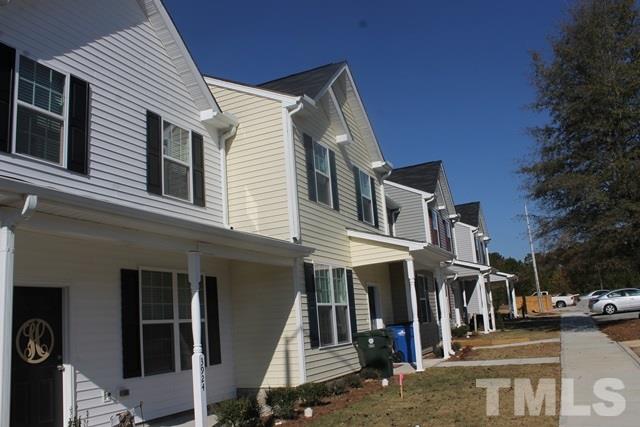3972 Volkswalk Place Raleigh, NC 27610 - Photo 2 of 24 a view of a building with a street