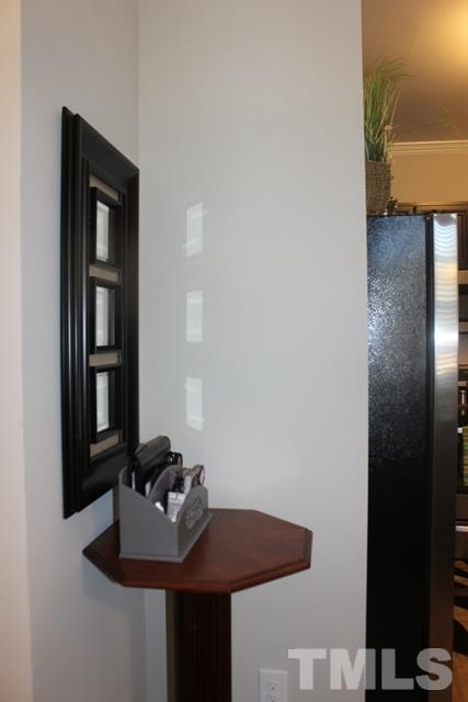 3972 Volkswalk Place Raleigh, NC 27610 - Photo 9 of 24 a table with chairs and wooden floor