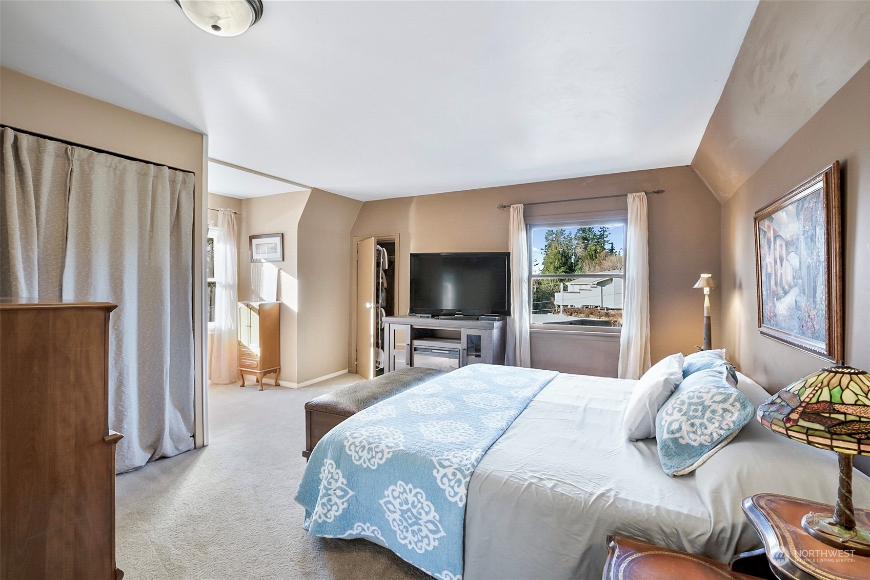 2322 Cherry Road Lake Stevens, WA 98258 - Photo 28 of 35 a bedroom with bed and a flat tv screen on dresser