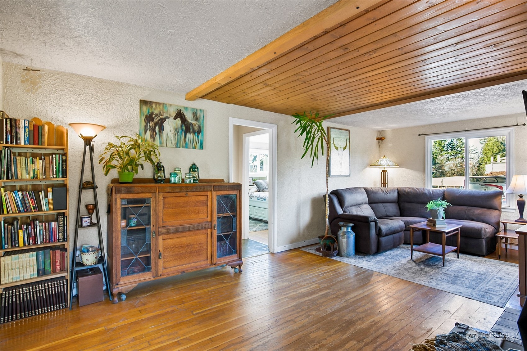 2322 Cherry Road Lake Stevens, WA 98258 - Photo 3 of 35 a living room with furniture and a book shelf