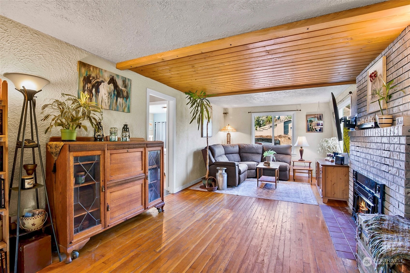 2322 Cherry Road Lake Stevens, WA 98258 - Photo 7 of 35 a living room filled with furniture and a fireplace
