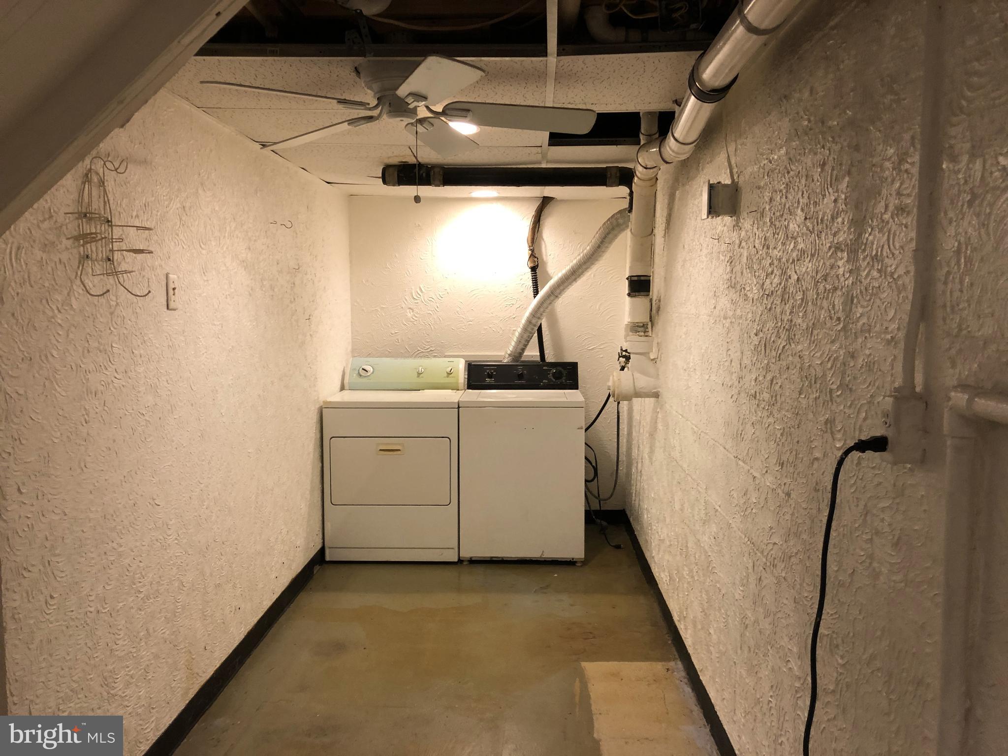 792 Stinchcomb Road Severna Park, MD 21146 - Photo 31 of 40 Basement Laundry and Sump Pump