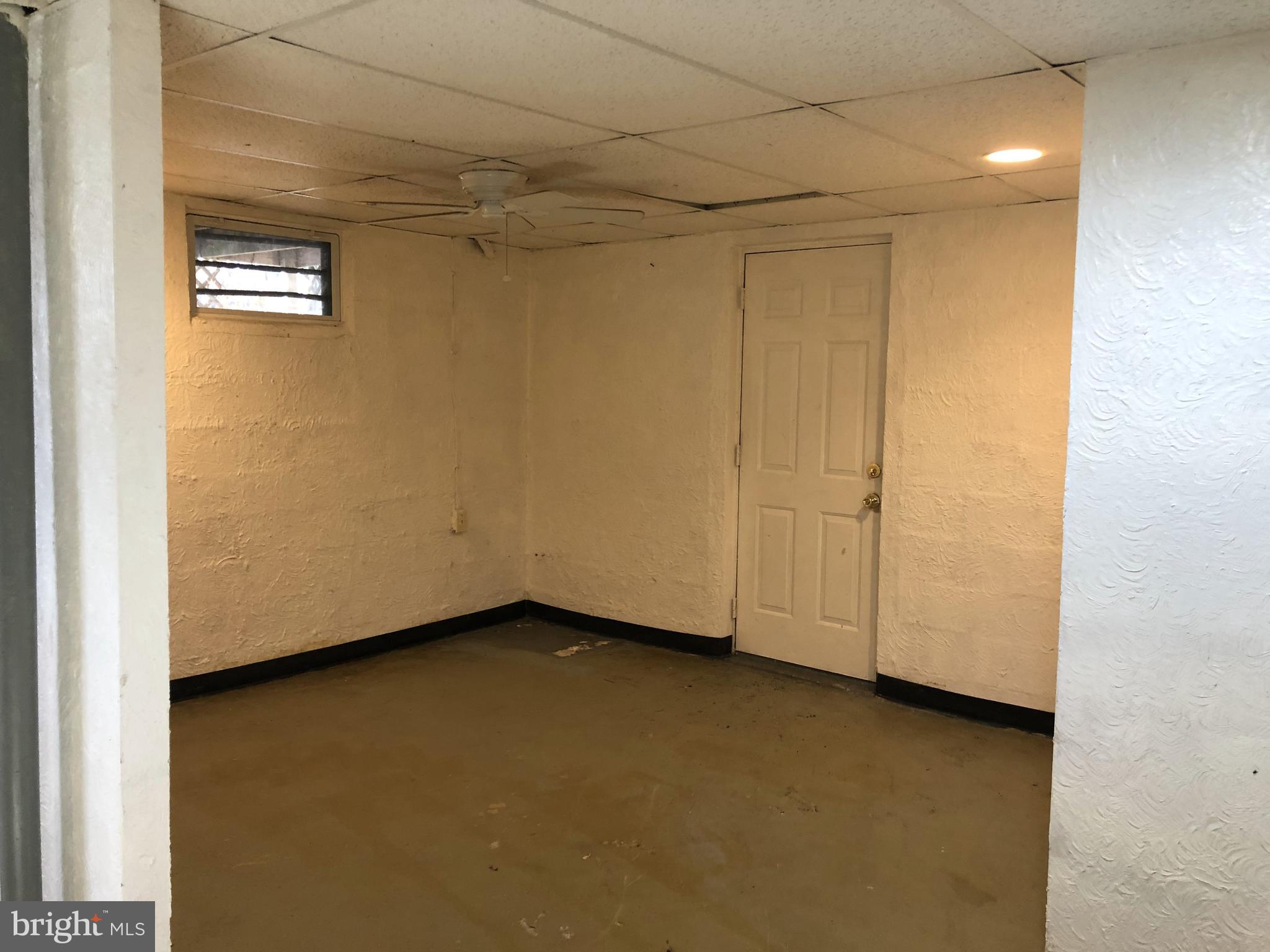 792 Stinchcomb Road Severna Park, MD 21146 - Photo 34 of 40 Basement Walkout Door to the rear of the house