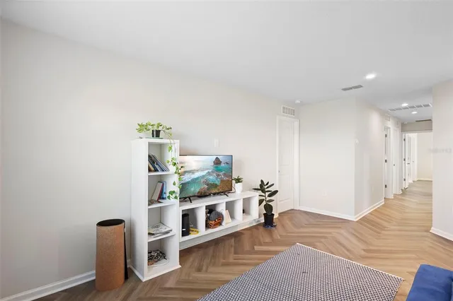 a bathroom with a sink a mirror and a shower